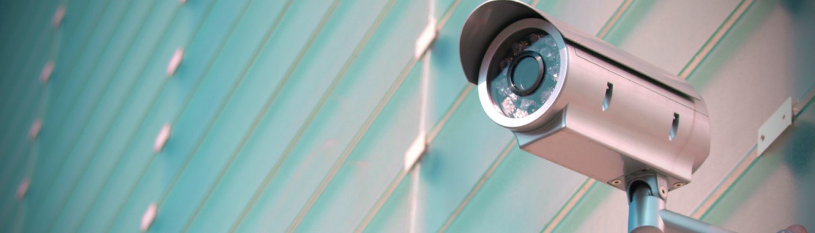 security camera mounted to a wall
