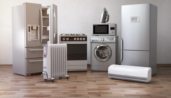 various appliances placed on the floor next to one another