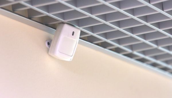 occupancy sensor mounted to a wall